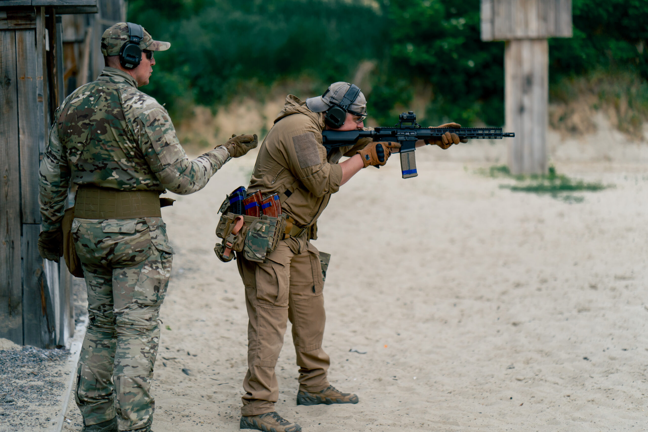 Close‑quarters tactical training drill in a gym setting